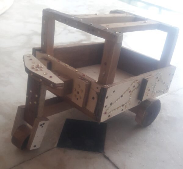 a wooden toy car on a tile floor - HandMade Wooden Riksha Toy